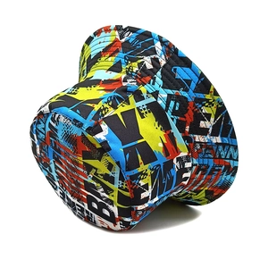 Close-up of colorful graffiti print and durable canvas texture on a trendy bucket hat
