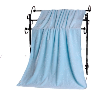 Light blue microfiber bath towel with embossed bear patterns and soft textured surface