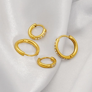 Set of four gold 18K plated stainless steel hoop earrings with round zircon stones