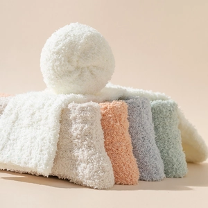 Set of five plush coral fleece crew socks in pastel colors for winter warmth