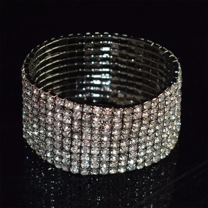 Macro shot of silver-tone multi-row bridal bracelet with sparkling crystal rhinestones