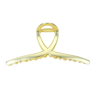 Minimalist glossy gold metal shark hair claw clip with large loop handle on white background