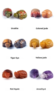 Macro display of assorted natural gemstone turtles including Unakite and Tiger Eye stones