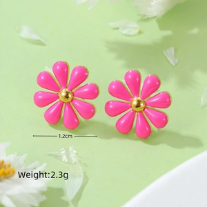 Detail view of pink daisy earrings showing 1.2cm diameter and 2.3g weight specs