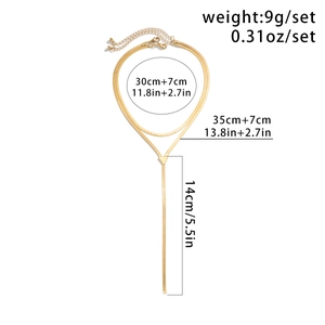 Detailed view of layered gold snake chain necklace with Y-shaped tassel and size dimensions
