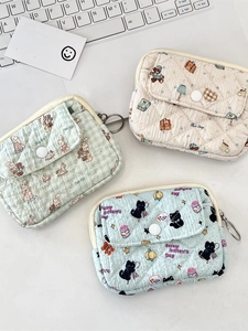 Quilted fabric mini coin purses with animal prints and secure snap flap closure