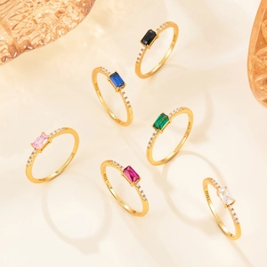 Detailed shot of gold plated S925 silver rings with colorful rectangular zircon stones