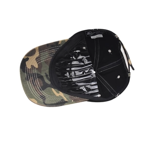 Interior view of camouflage cotton baseball cap with sweatband and quality labels