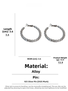 Detail view of 3.6cm textured silver hoop earrings with 925 sterling silver posts