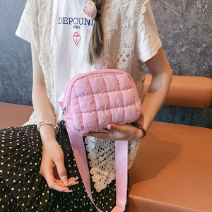 Pink quilted crossbody waist bag featuring warm padded lattice design and wide strap