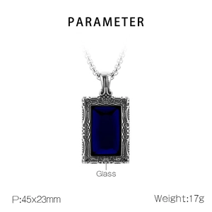 Vue détaillée du pendentif vintage avec pierre bleue et dimensions gravées