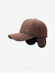 Detail view of brown winter wool baseball cap with earflaps and fashion metal buckle