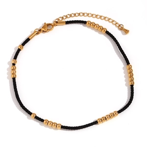 Black woven rope anklet with 18K gold-plated stainless steel beads and lobster clasp