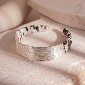 Silver multi-strand open cuff bracelet with stylish zebra print leather accents on stone
