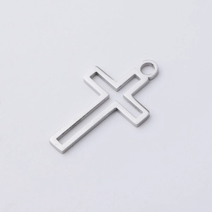 Detailed close-up of a silver hollow cross pendant with a minimalist steel frame design