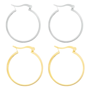 Detailed view of large round gold and silver hoop earrings with secure snap closure