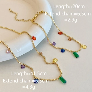 Detail of colorful geometric gemstone gold bead chain showing length and weight specs
