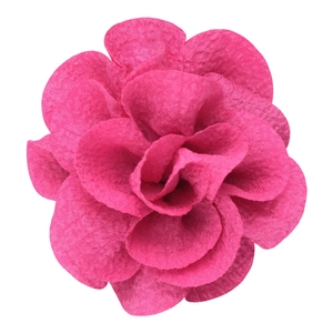 Close-up of rose red bubble crepe handmade flower accessory with fabric petal texture