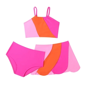 Three-piece girls swimsuit set featuring pink and orange geometric color block design