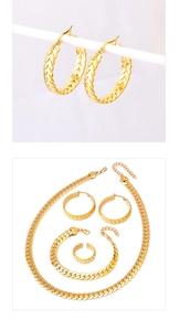 Detailed view of gold woven jewelry set including necklace, bracelet, earrings and ring