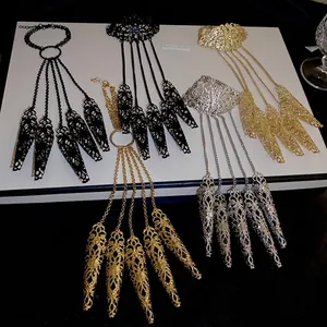 Exotic hollow flower armor finger ring bracelet set in gold, silver, and black metal