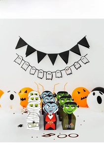 Halloween monster candy gift boxes featuring mummy, vampire and frankenstein designs