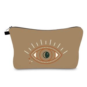 Close-up of water-resistant terracotta eye print makeup bag with zipper detail