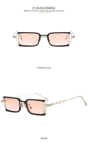 Close-up of rectangle black and gold sunglasses with orange lenses and triple metal temple