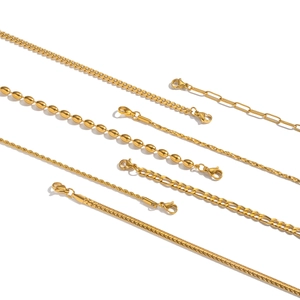 Minimalist gold link chain necklace set featuring various geometric styles for layering