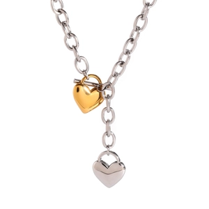 Modern two-tone heart lock pendant necklace in gold and silver polished stainless steel