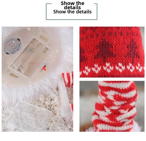 Close-up of internal LED battery module and festive knit fabric of the Christmas gnome