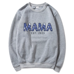 Gray Mama Est 2025 hoodie with floral lettering on white background in flat lay view