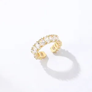 Detail showing a gold-plated open ring with oval cubic zirconia, 1.9cm diameter and 5g