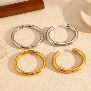 Modern gold and silver hollow stainless steel bangles in minimalist C-shape and round styles