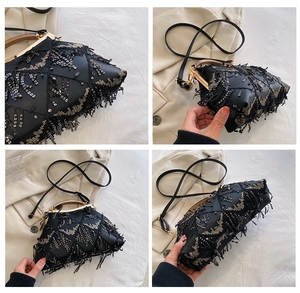 Detail of black sequined evening bag with tassel fringe and vintage metal handle