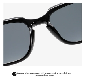 Close-up of comfortable integrated nose pads on black glossy square sunglasses
