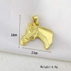 Detail of gold horse head pendant with dimensions 2.6cm x 2.1cm and 4.8g weight
