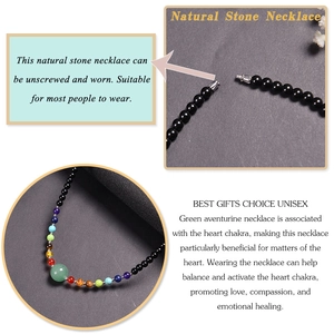 Detailed view of Seven Chakra stone necklace with a green aventurine heart and screw clasp