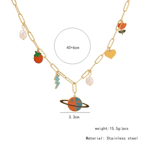 Detail view of gold stainless steel necklace with size annotations and charms