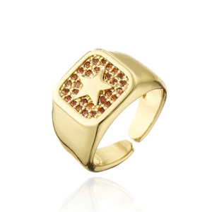 Detail of 18K gold plated punk star ring with sparkling orange zircon stones