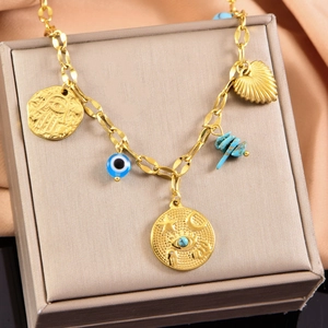 Golden steel charm bracelet with turquoise, Evil Eye, and Fatima Hand charms