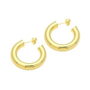 Macro shot of 18k gold plated twisted spiral C-shaped stud earrings with a glossy finish