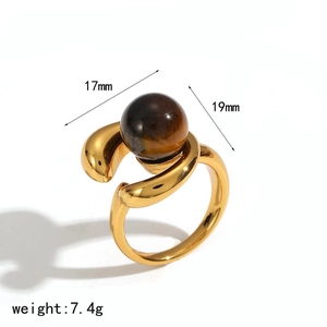 18k gold plated stainless steel ring with round amber tiger eye stone and long shadow