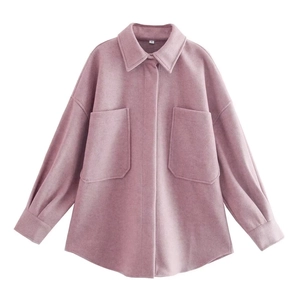 Detailed view of dust pink wool blend shacket with collar and utility chest pockets