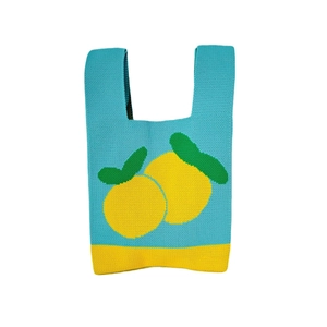 Blue knitted tote bag with yellow lemon pattern and top handles for daily casual use