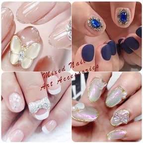 Detailed view of assorted mixed nail art accessories including resin flowers and alloy bows