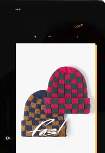 Detail view of two checkered knit beanies in blue-brown and pink-green color combinations