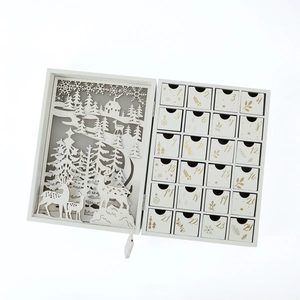 Detail of wooden LED Christmas advent calendar with 24 drawers and reindeer cutout