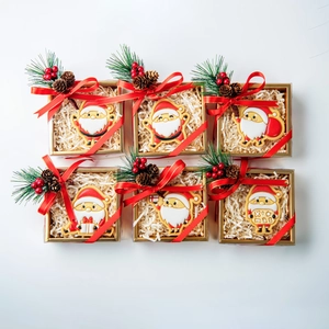 Six-piece Christmas Santa cookie gift set with pine cones and festive red ribbons