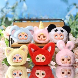 Detailed view of six cute animal plush keychain charms on a miniature park bench